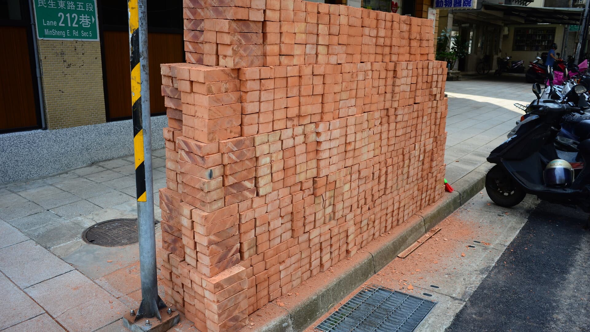 Authentic red clay bricks stacked at Shubham Bricks brickyard in Alwar