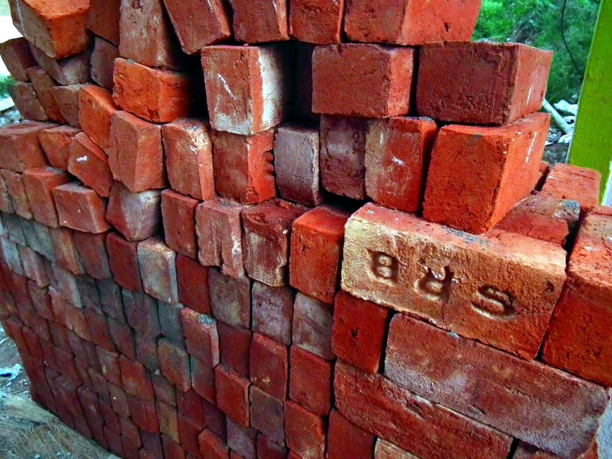 Authentic brick stacks at Shubham Bricks manufacturing facility in Alwar